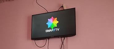 samsung dvd player: Premier Smart TV + səsli idarəetməli pult - Ekran: düz çərçivəli LED — 1