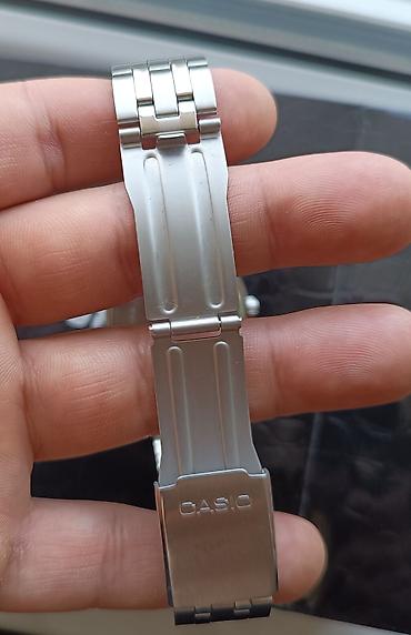 5 15: Casio kişi qol saatı - Model: MTP seriyası (arxa qapaqda MTP-1383 — 3
