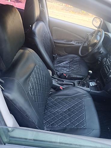 red cell: Nissan Almera: 2000 г., 1.5 л, Механика, Бензин, Хэтчбэк — 7