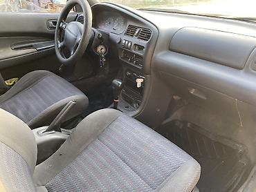 mazda 2000: Mazda 323: 1994 г., 1.6 л, Автомат, Бензин, Седан — 5