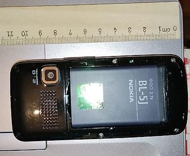 nokia e52: Это городской телефон с сим картой.(мобильный).,стационарный — 2