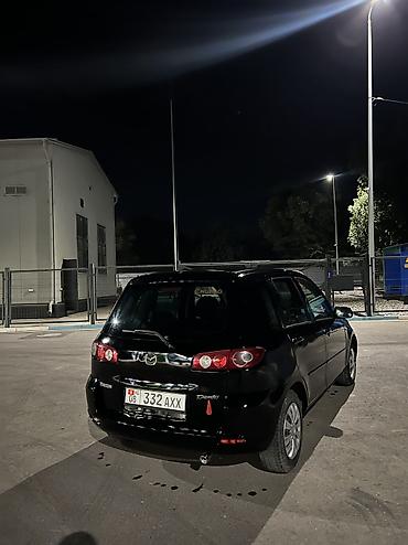 Транспорт: Mazda Demio: 2004 г., 1.3 л, Автомат, Бензин, Хэтчбэк — 5