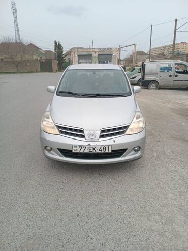 Nissan: Nissan Tiida: 1.5 l | 2012 il Sedan