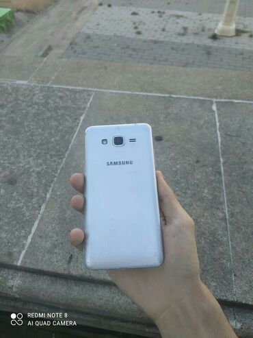 maqnit telefonlar: Samsung Galaxy J2 Prime, 4 GB, rəng - Boz, İki sim kartlı, Face ID