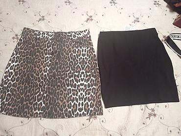 mini ətək: Qadın ətək dəsti - 2 ədəd ətək: biri leopard naxışlı A-kəsim mini — 1