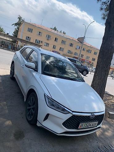 Другие автомобили: Электромобиль в синем цвете, модель 2024 года, обладает современным — 9