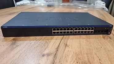 prosessor satilir: Juniper EX2200-24T-4G | 24 managed port + 4 SFP uplink Peşəkar — 1