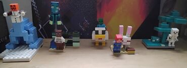 oyuncaq 07: Minecraft temalı LEGO fiqurları dəsti. Dəstdə müxtəlif personajlar və