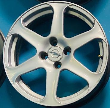 6 bolt: Opel orijinal yüngül lehimli disklər - Model: Opel 6-şüalı, mərkəzdə — 2