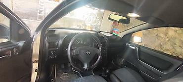 avto aksesuarlar: Opel Astra: 1.6 l | 1999 il 239000 km Sedan — 6