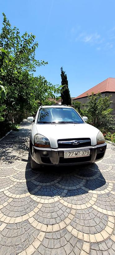 qabaq şüşə: Hyundai Tucson: 4.4 l | 2009 il Krossover — 10