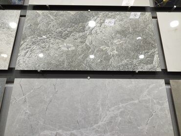 otağ qapları: Boz rəng palitrasında daş fakturalı keramika plitələr - Material