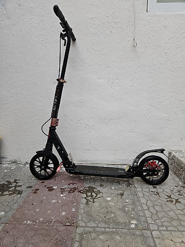 Şəhər içi rahat hərəkət üçün mexaniki (elektriksiz) skuter