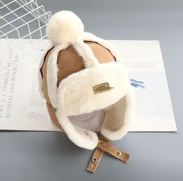 шапка для детей: Теплая зимняя шапка!!! качество отличное, кожаная меховая шапка для