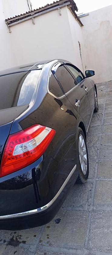 moto 500: Nissan Teana: 2.5 l | 2011 il Sedan — 5