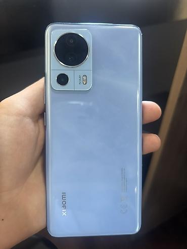 ok google: Смартфон Xiaomi 13 Lite, цвет голубой. Характеристики по устройству — 3