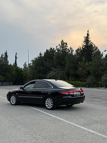 buggy satisi: Hyundai Azera – biznes-seqment sedan - Kuzov: qara rəng, 4 qapılı — 4