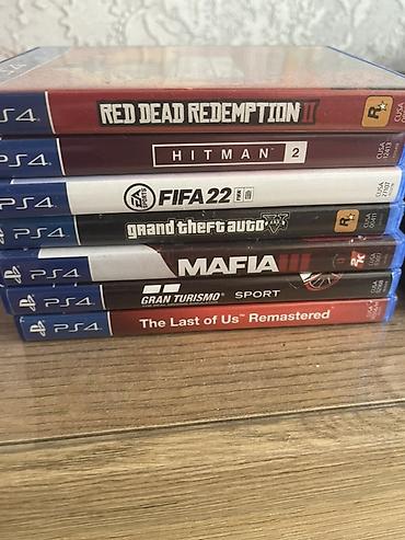 PS4 (Sony Playstation 4): **Sony PlayStation 4 Pro konzola sa dodatnom opremom i igrama** Na — 2