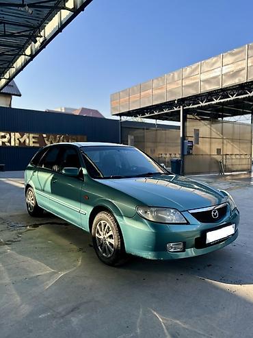 50 55: Mazda 323: 2001 г., 1.6 л, Автомат, Бензин, Хэтчбэк — 2