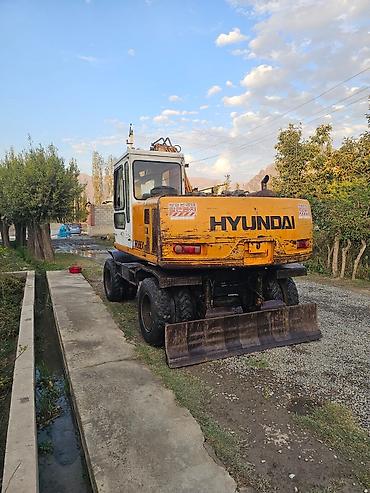 Коммерческий транспорт: Экскаватор, Hyundai, 1999 г., Колесный — 5