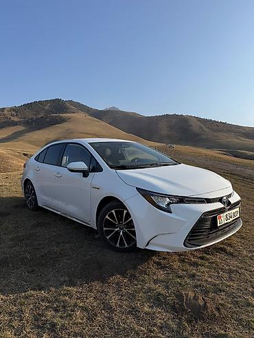 corolla 2006: Toyota Corolla: 2023 г., 1.8 л, Автомат, Гибрид, Седан — 1