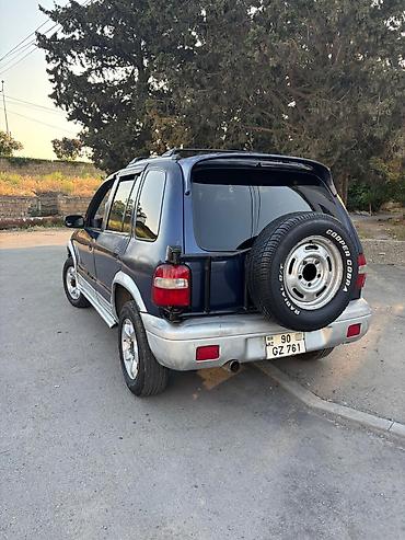 mustan: Kia Sportage: 2 l | 1999 il Ofrouder/SUV — 3