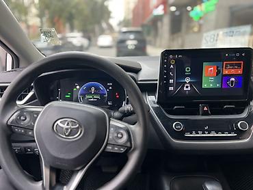 продажа гибридных автомобилей: Toyota Corolla: 2023 г., 1.8 л, Вариатор, Гибрид, Седан — 8