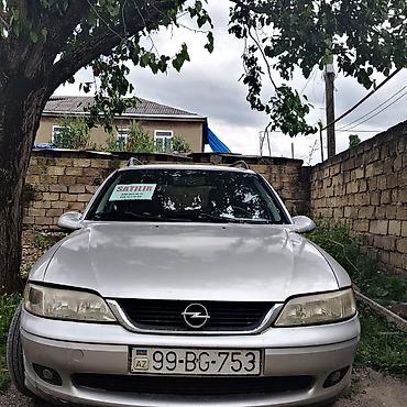 Opel: Opel unversal İli 2001 Karopka 5 skorustu Mator 1.8 Tex pasport qeyd — 1