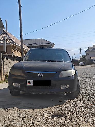 чип панели: Mazda 323: 2002 г., 1.6 л, Автомат, Бензин, Седан — 4