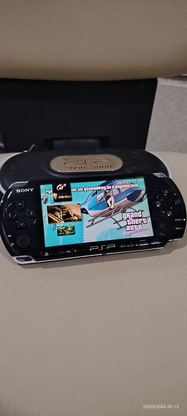 PSP (Sony PlayStation Portable): PSP 3004 tam komplekt son cixan modellerden di yeni kimidi qetiyyen