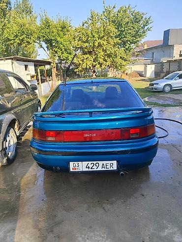 гитара 124: Mazda 323: 1992 г., Механика, Купе — 2