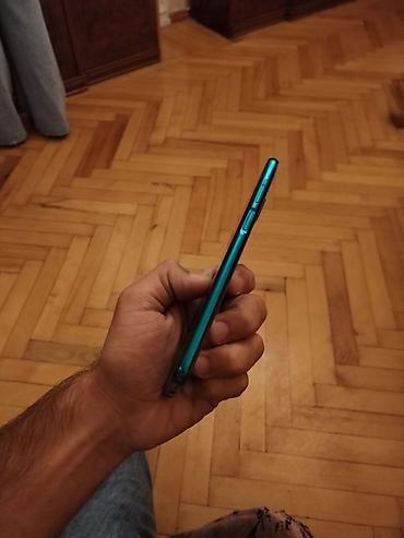 xiaomi mi a3: Redmi smartfon Tam ekran dizayna malik, ön hissədə mərkəzdə damcı — 3