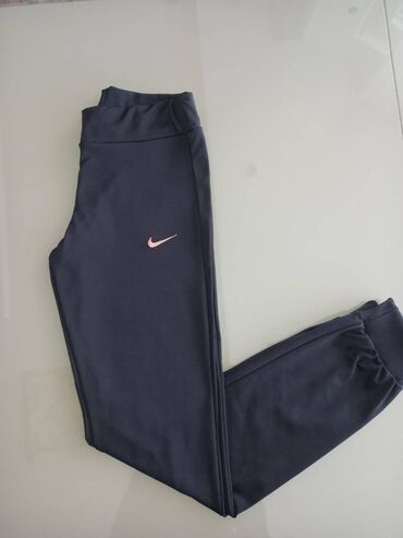 tech fleece novi modeli: Nike ženska trenerka donji deo sa ranflom Novo Mokra likra Veličine