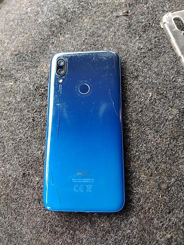 korpuslar: Redmi smartfon - Model: Redmi (M1906F9LG yazısı görünür – Redmi 8/8A — 4
