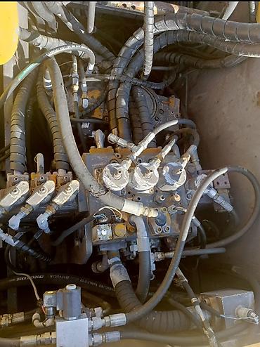 фрезер е26: Экскаватор, Volvo, 2004 г., Колесный — 1
