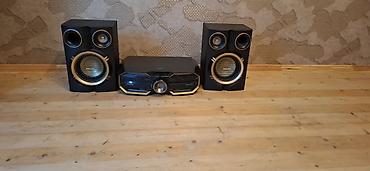 musiqi merkezi: PHILIPS mini audio sistemi – 2 güclü akustik kolon və mərkəzi blokdan — 5