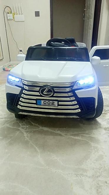 Детский электромобиль-внедорожник (стилизованный под Lexus/LX) -