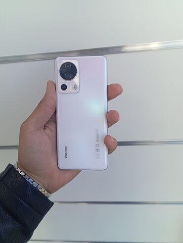 Xiaomi: Xiaomi 13 Lite, 256 GB, rəng - Narıncı, 
 Düyməli, Barmaq izi, İki sim kartlı