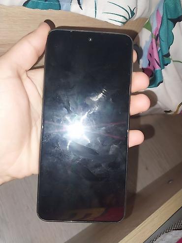 philips xenium 9@9z: Telefonu arxa şüşəsi sınıb,ekranda cızığlar var,nömrə yeri — 1