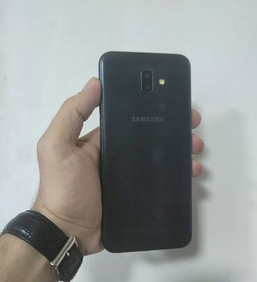 samsung a6 plus: Samsung Galaxy J6 Plus, 32 GB, rəng - Qara, Barmaq izi, İki sim kartlı, Face ID