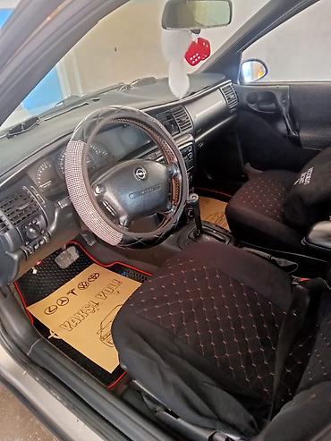 603 мотор: Opel Vectra: 2 л | 1996 г. Седан — 4