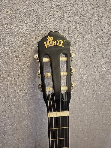 Классические гитары: WINZZ klassik gitara satılır, ölçüsü 4/4, qara rəngdədir. Gitara demək — 3