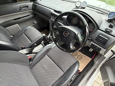 Subaru Forester: 2002 г., 2 л, Кол менен иштөөчү, Бензин, Универсал — 9