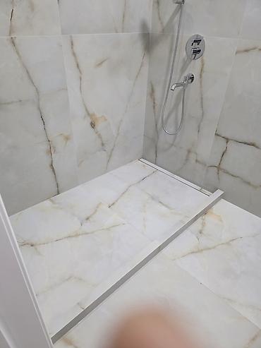 Укладка плитки: Профессиональная укладка крупноформатного керамогранита и плитки под — 12