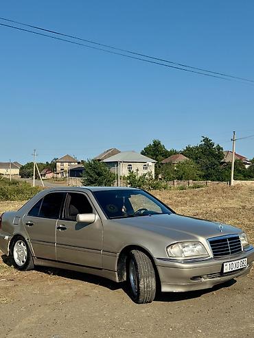 w203 mercedes: Mercedes-Benz C-Class: 1.8 l | 1994 il Sedan — 6