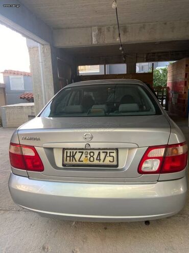 Οχήματα: Nissan Almera: 1.5 l. | 2004 έ. Χάτσμπακ