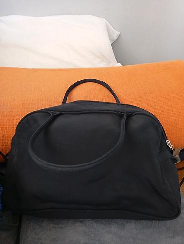 Putni koferi i torbe: Set torbi i tašni – više modela - Elegantna crna tašnica sa metalnim — 19