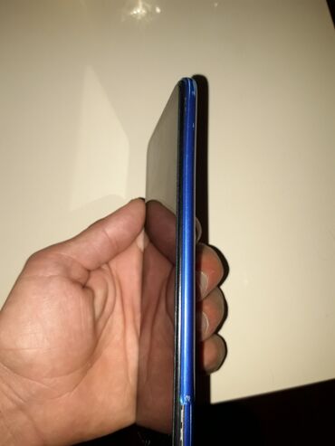 telefonlar 32 s: Xiaomi Redmi 9C, 64 GB, rəng - Mavi, 
 Barmaq izi