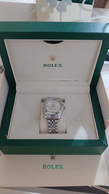 Rolex kişi qol saatı – klassik gümüş tonlarda - Model xətti: Rolex