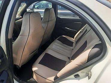 2 5 dizel mator: Nissan Sunny: 1.3 l | 2006 il Sedan — 4